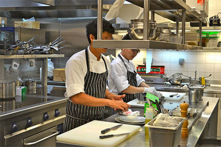 Chef preparing food.