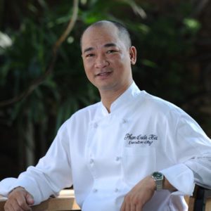 male wearing white chef uniform