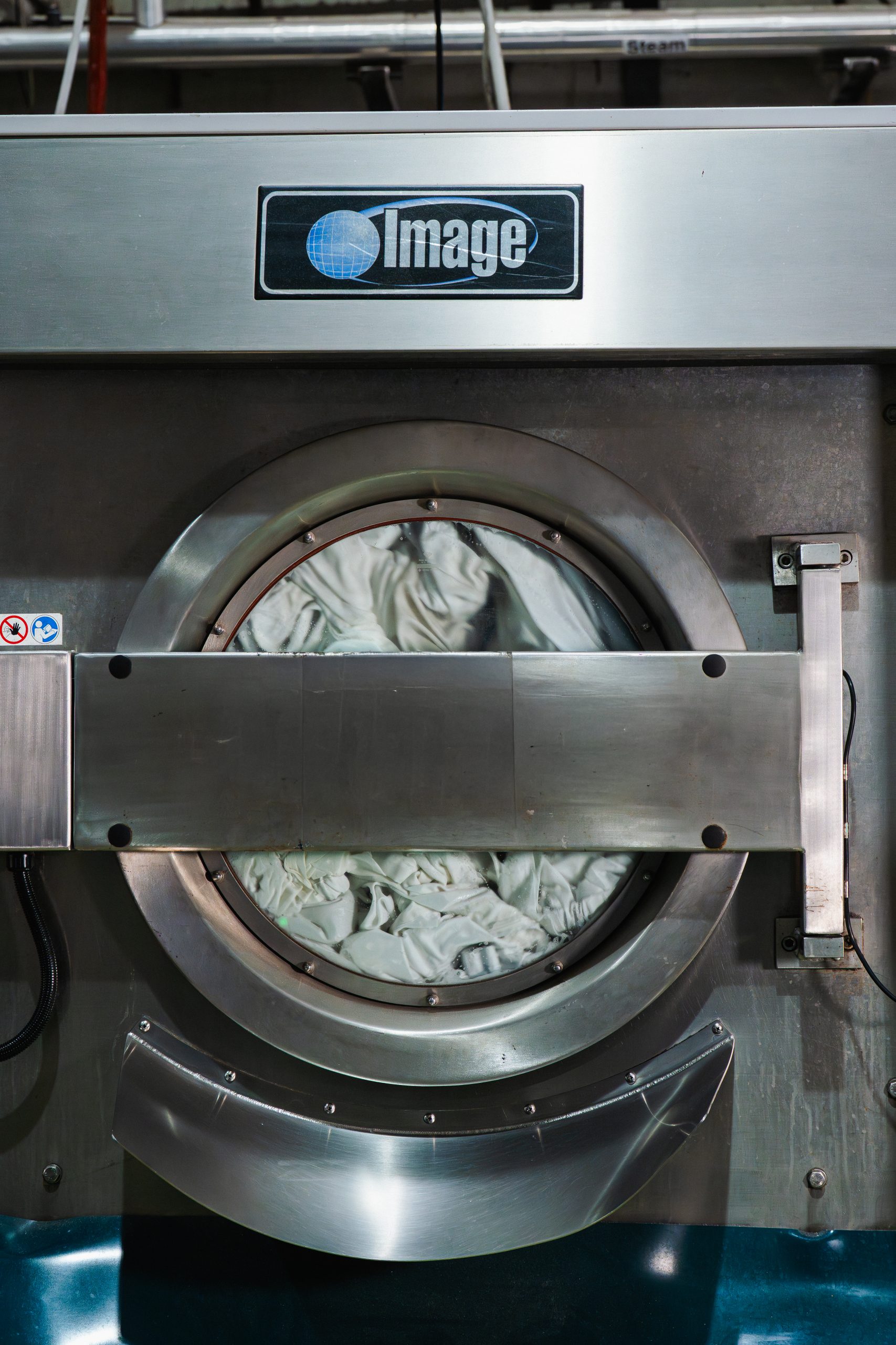 Alsco Singapore professional commercial laundering process